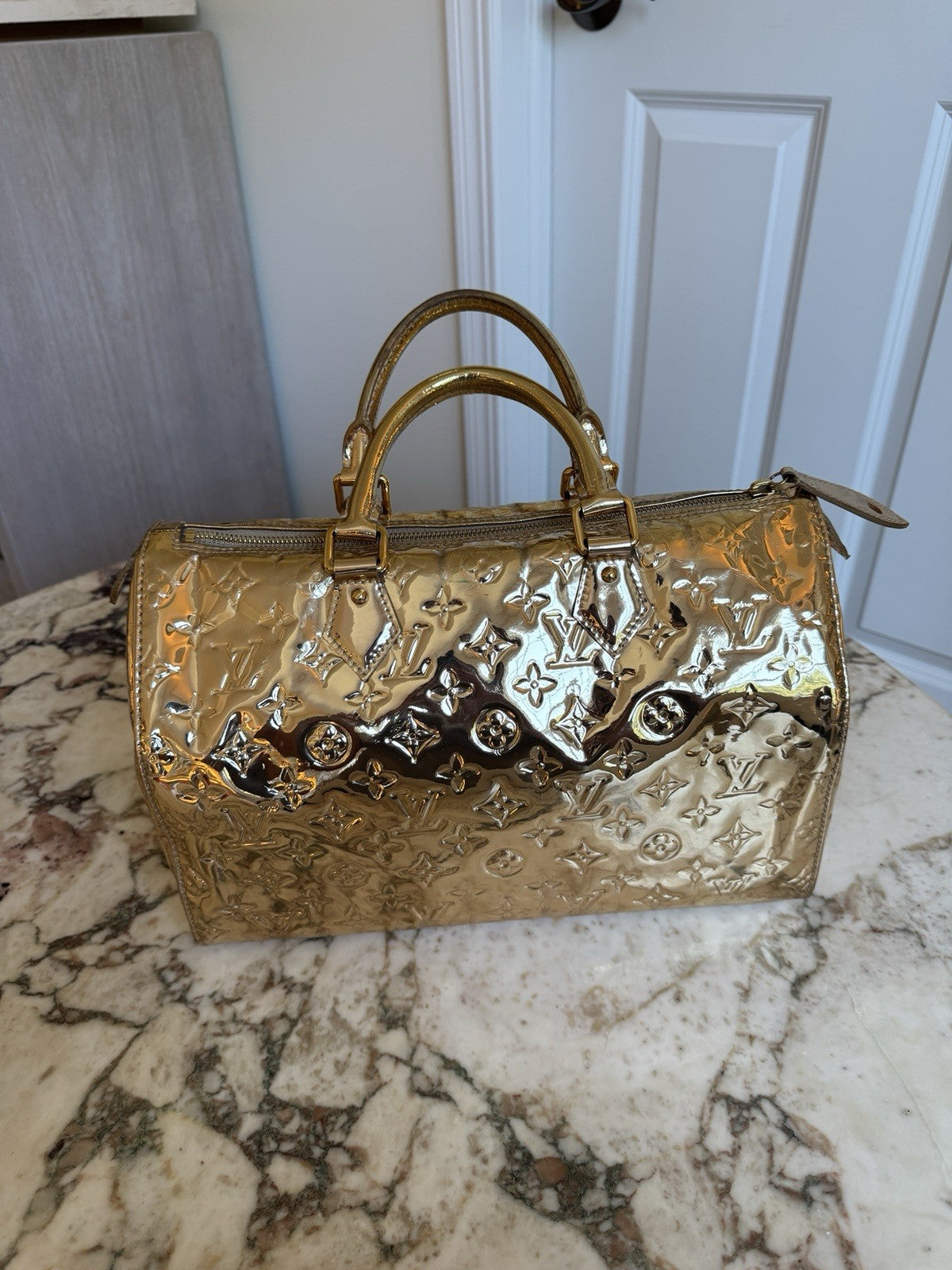 Louis Vuitton Gold Mirror Speedy